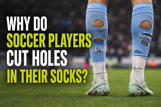 Soccer player wearing football socks with cut holes around the calves on the field.