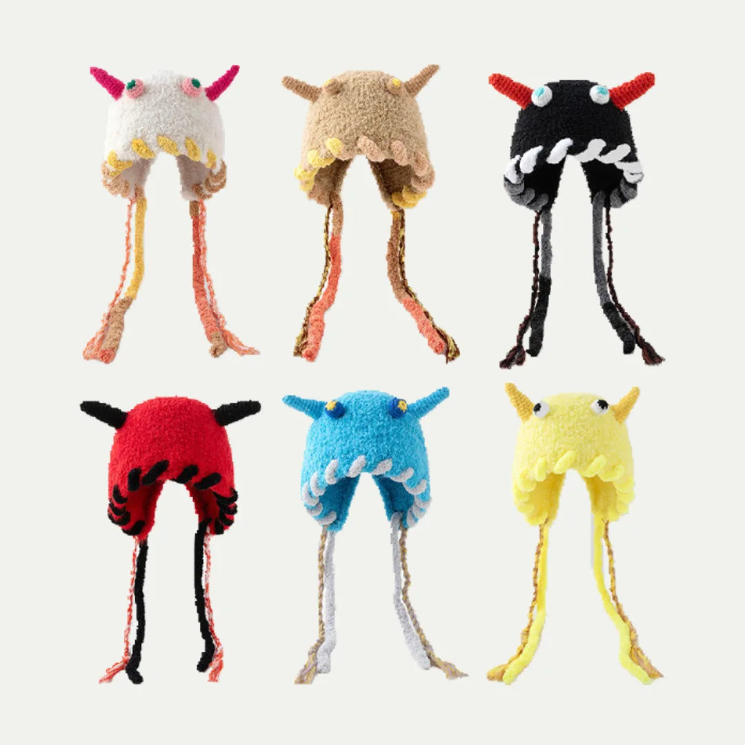 plush beanies in multiple colors with earflaps