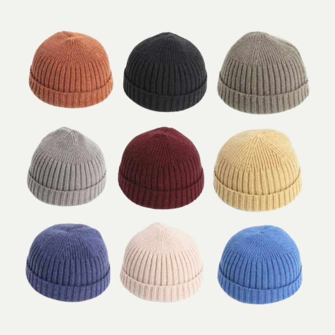short ribbed fisherman beanies arranged in multiple solid colors on white background