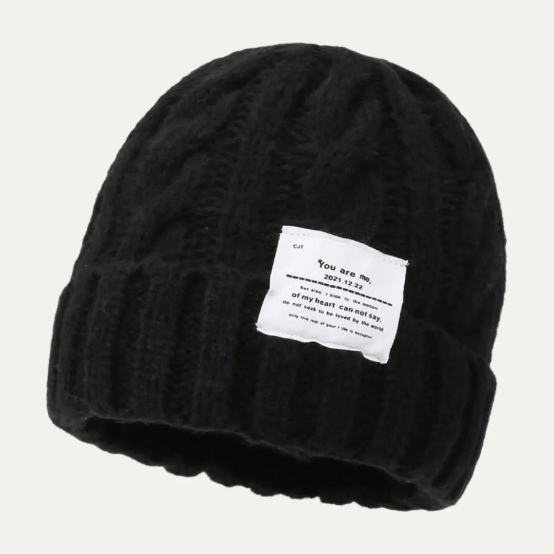 black cuffed beanie with front fabric label patch