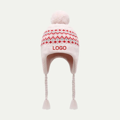 pink knit earflap beanie with pom and braided tassels
