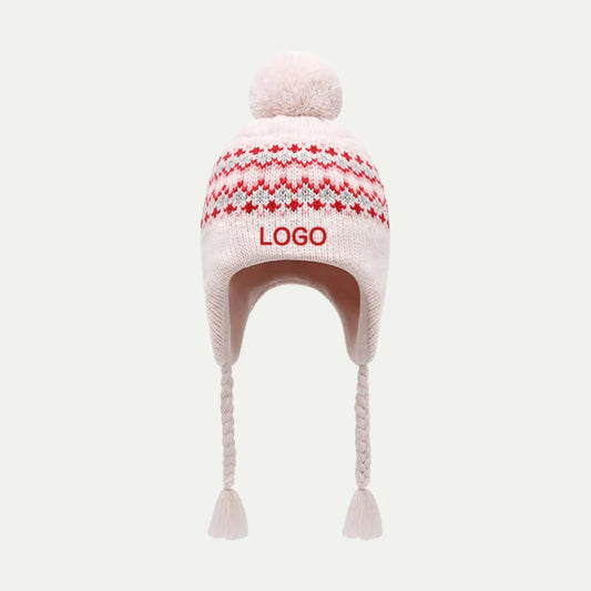 pink knit earflap beanie with pom and braided tassels
