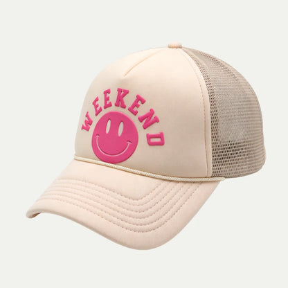 cream custom puff print mesh trucker hat angled front view with pink logo
