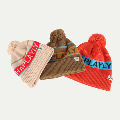jacquard knit pom beanies text design multicolor