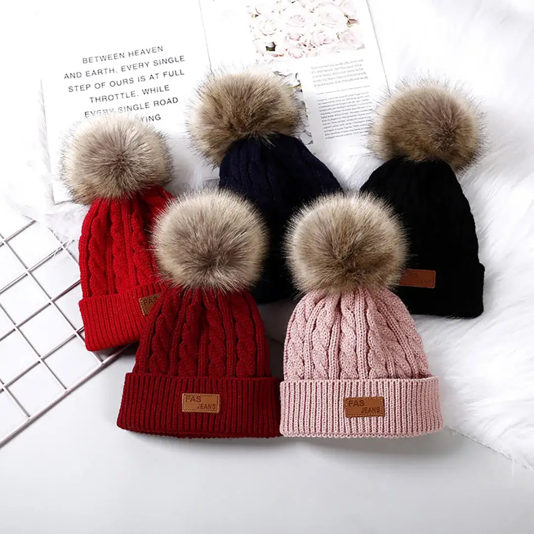 assorted cable knit pom pom beanies with faux fur