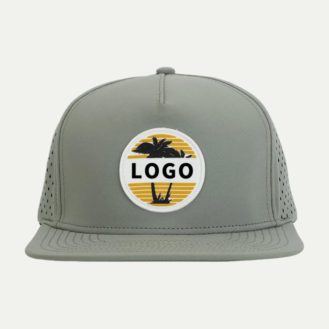 sage custom perforated performance trucker hat front view with round logo patch
