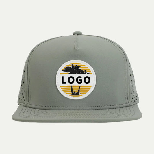 sage custom perforated performance trucker hat front view with round logo patch