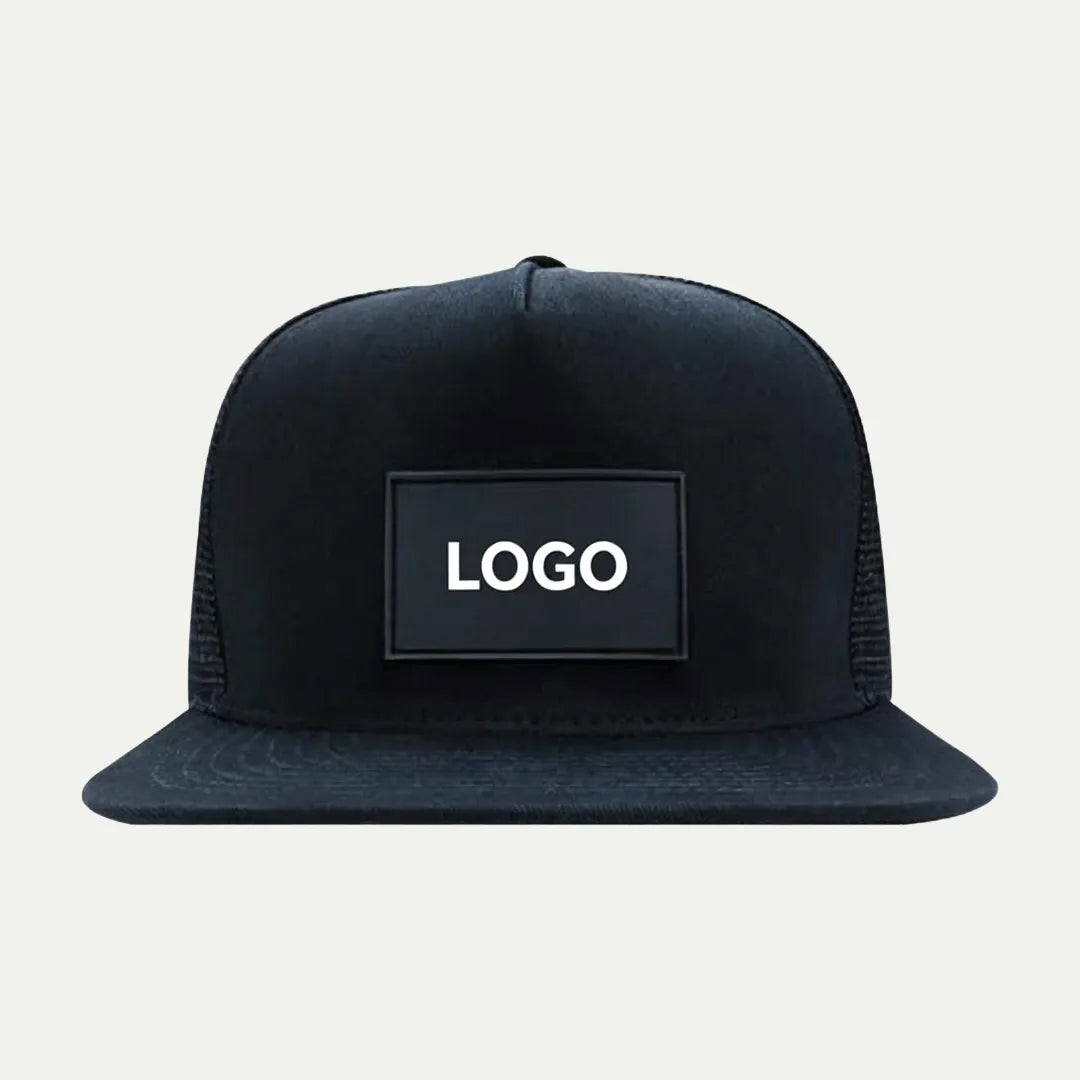 black custom flat brim trucker hat with front logo patch