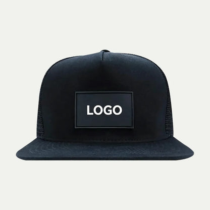 black custom flat brim trucker hat with front logo patch