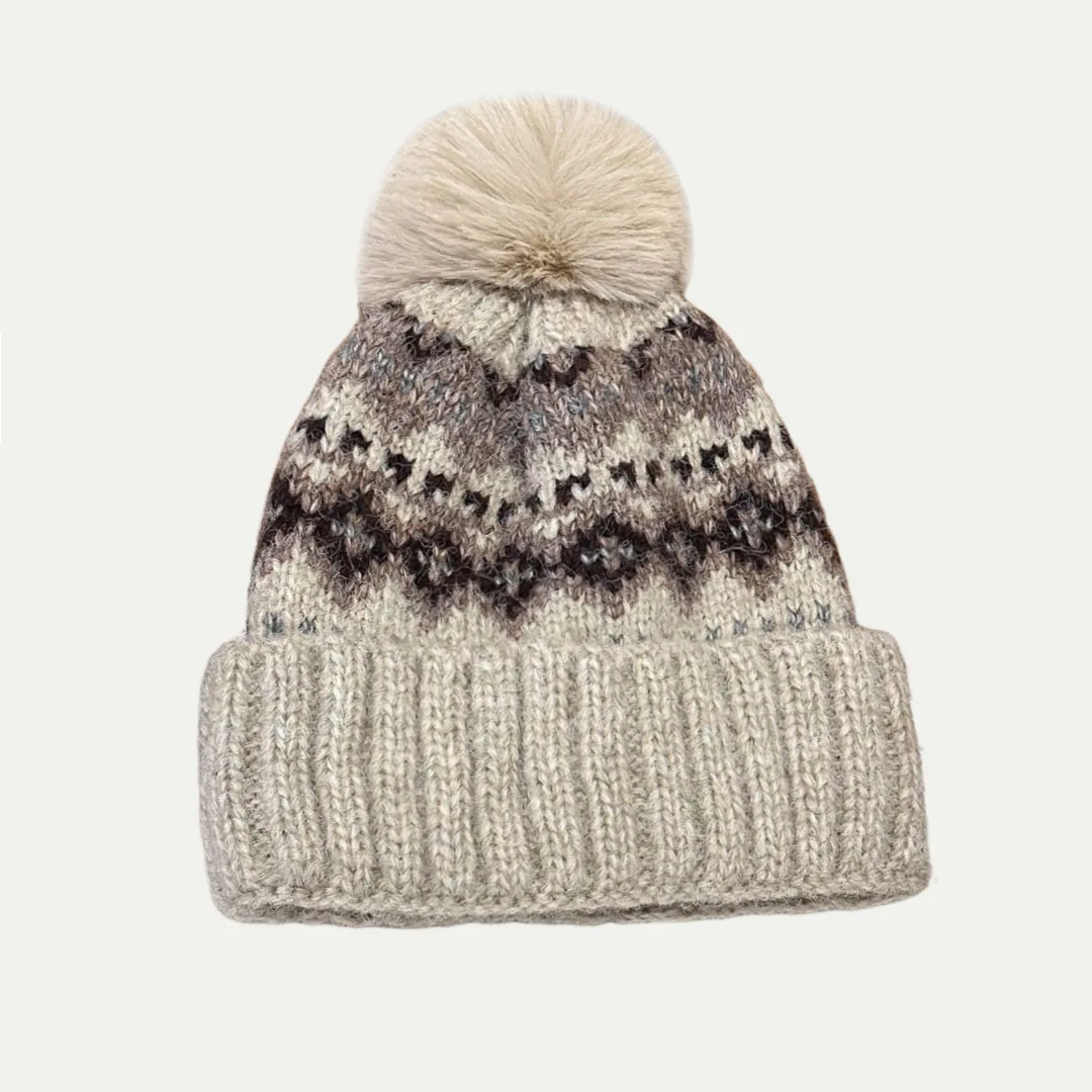 neutral pattern pom beanie with faux fur
