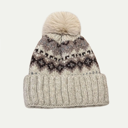 neutral pattern pom beanie with faux fur